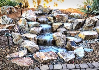 Pondless Waterfall with Different Size Rocks and Lighting
